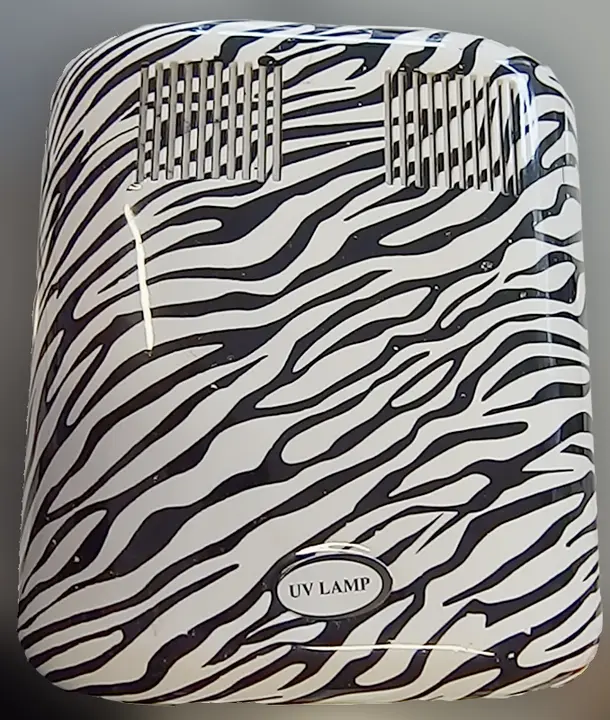 Foto do aviso oficial: Professional Nail Gel UV Lamp Lâmpada de unhas UV — risco: Choque elétrico (A12/00427/20)
