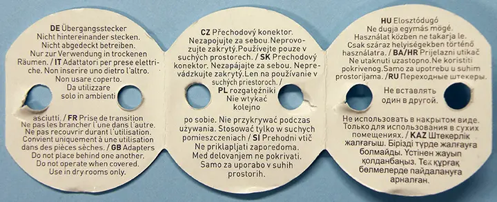 Photo from the official notice: GREENGATE Übergangsstecker / Elosztódugó three-sockets extension with a switch — electric shock risk