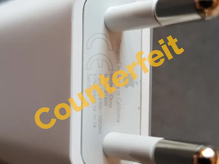 Zdjęcie z oficjalnego zgłoszenia: Apple (counterfeit) Original Apple 5W USB Adapter MD813ZM - BULK Ładowarka USB/adapter — ryzyko: Porażenie prądem & Pożar
