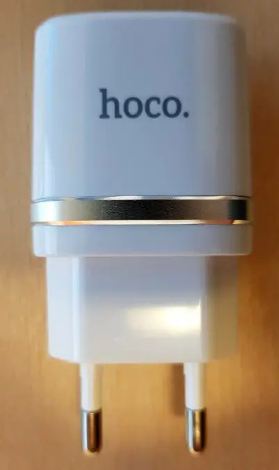 Photo from the official notice: hoco. Dual USB charger — electric shock & fire risk