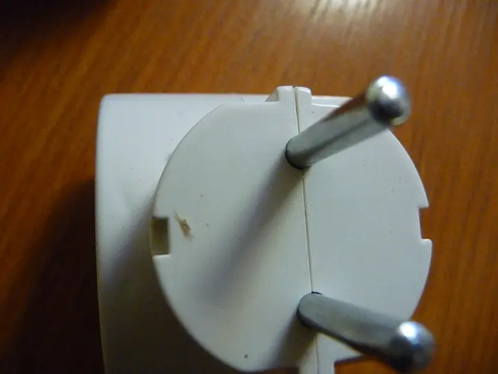 Photo from the official notice: Adapter multiplug socket — burns & electric shock risk