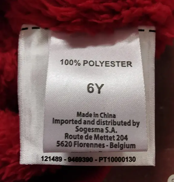 Foto aus der offiziellen Meldung: TQF Kinderpullover — Risiko: Strangulierung