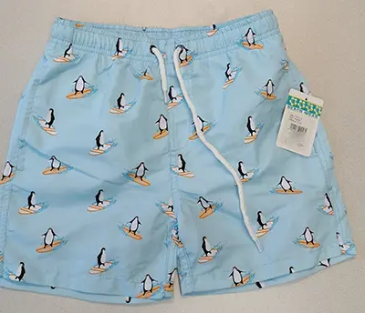 Foto do aviso oficial: Beach Wear Calça de banho infantil — risco: Ferimentos