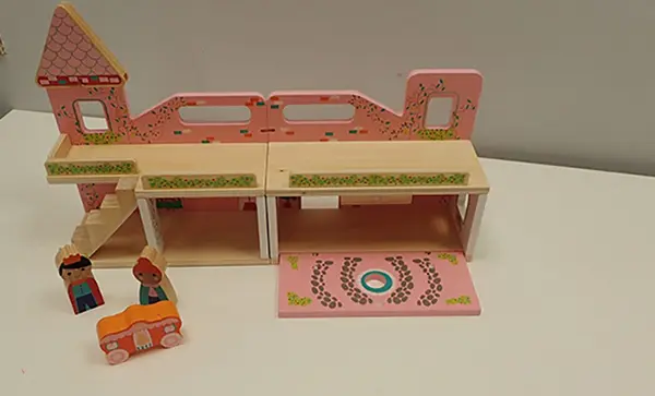 Photo from the official notice: Mini Matters Wooden Portable Doll House — choking risk