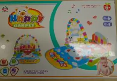Photo from the official notice: Happy Carpet playmat — choking & strangulation risk