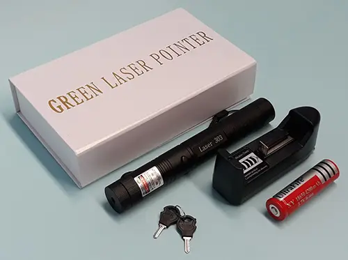Photo from the official notice: GREEN LASER POINTER; Li-ion Battery Universal Charger laser pointer with charger — damage to sight & electric shock risk