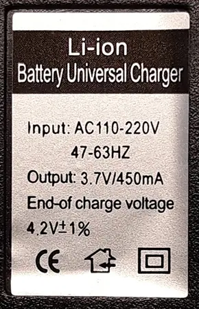 Photo from the official notice: GREEN LASER POINTER; Li-ion Battery Universal Charger laser pointer with charger — damage to sight & electric shock risk