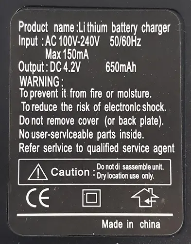 Photo de l’avis officiel: LASER (on the packaging); Li thium battery charger (on the charger) Pointeur laser avec chargeur — risque: Dommages à la vue & Choc électrique
