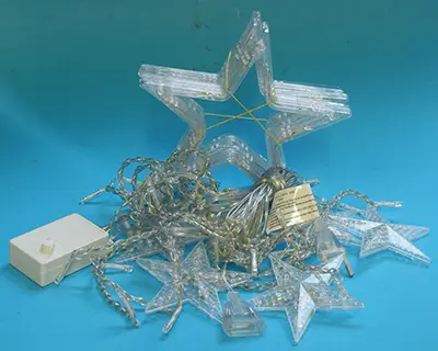 Foto do aviso oficial: Five-pointed star Corrente de iluminação — risco: Queimaduras & Choque elétrico