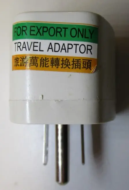 Photo from the official notice: UK/AU/EU to US AC Power Plug Adaptor travel adaptor — electric shock risk