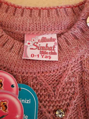 Photo de l’avis officiel: SIMBAT ALTUNLAR Girl wear - kids club Pull bébé — risque: Étouffement