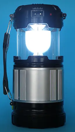 Foto uit de officiële melding: ZM SOLAR ZOOM CAMPING LAMP Draagbare LED-lamp — risico: Brandwonden & Elektrische schok