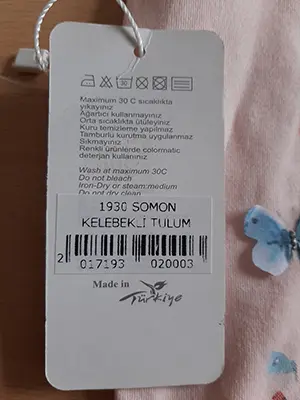 Photo from the official notice: Tongs baby baby's bodysuit — choking risk