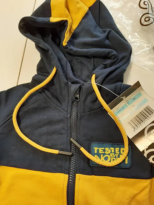 Photo from the official notice: KILPI KILPI COTNY JB KJ0090KI children's sweatshirt — strangulation risk