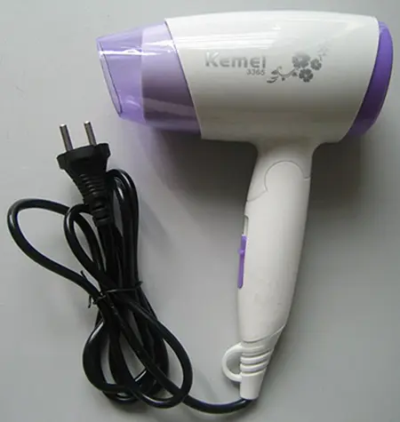 Photo de l’avis officiel: Kemei hair dryer Sèche-cheveux — risque: Brûlures & Choc électrique