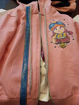Foto uit de officiële melding: „Jeliboom“ Kinderkleding set — risico: Verwonding & Verwurging