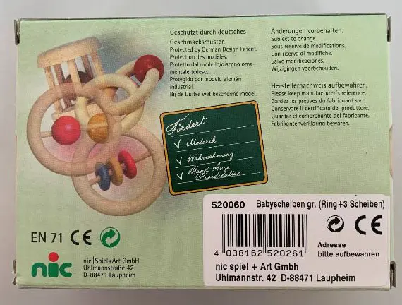 Foto aus der offiziellen Meldung: Glückskäfer Scheibenring Holz Rassel — Risiko: Ersticken