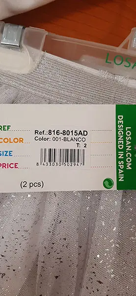 Foto aus der offiziellen Meldung: LOSAN Kinderbekleidung Set — Risiko: Ersticken