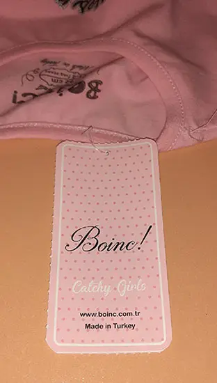 Foto aus der offiziellen Meldung: BOINC ! Catchy Girls Kinderbluse — Risiko: Ersticken