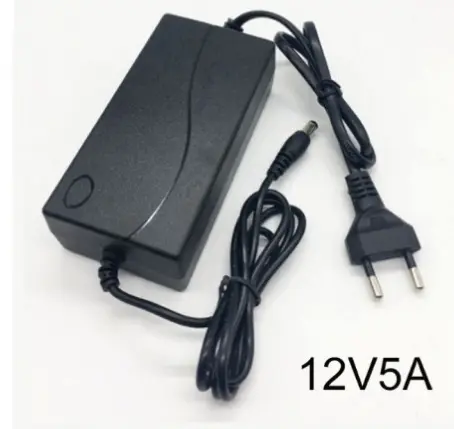 Foto dell’avviso ufficiale: 12V 5A 5.5 * 2.1mm LED Transformateur Alimentation Adaptateur UE Plug Alimentation Caricabatterie — rischio: Scossa elettrica