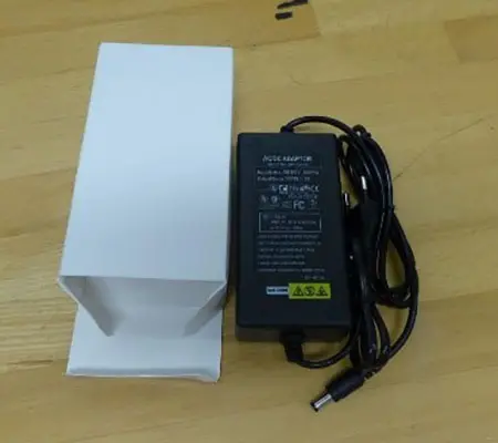 Foto dell’avviso ufficiale: 12V 5A 5.5 * 2.1mm LED Transformateur Alimentation Adaptateur UE Plug Alimentation Caricabatterie — rischio: Scossa elettrica