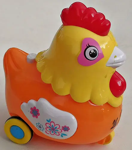 Photo from the official notice: YI BAO KINGDOM JOY CHICKEN plastic toy — choking risk