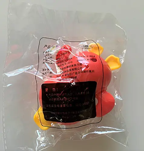 Photo from the official notice: Plastic toy duck — suffocation risk