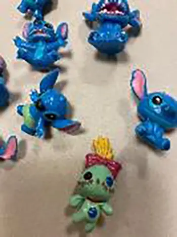 Foto do aviso oficial: 12pcs/Set Disney Lilo &amp; Stitch PVC dolls Anime act Conjunto de bonecas de plástico — risco: Químico