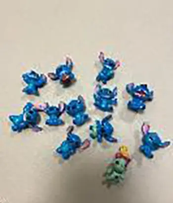 Foto do aviso oficial: 12pcs/Set Disney Lilo &amp; Stitch PVC dolls Anime act Conjunto de bonecas de plástico — risco: Químico