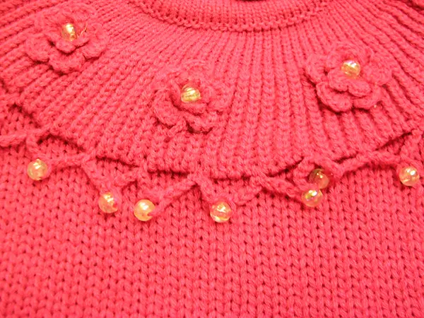 Foto aus der offiziellen Meldung: Yutokids Kinderpullover — Risiko: Ersticken