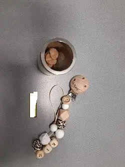 Photo from the official notice: Musthaves by Kell KIM- white/Leopard/Beech wood soother holder — choking risk