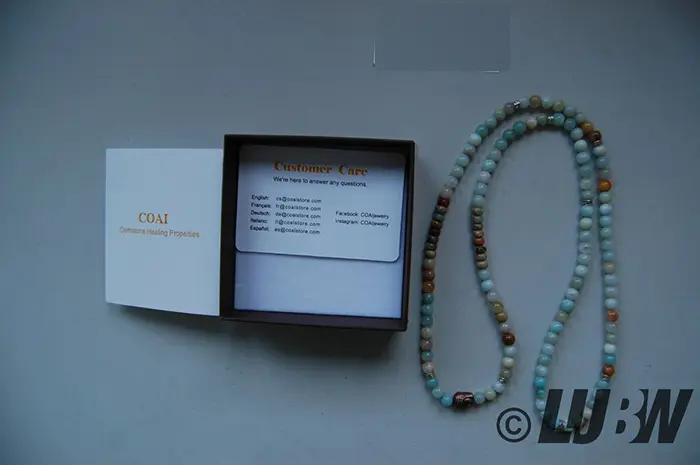 Foto aus der offiziellen Meldung: COAI coai Unisex 108 Mala aus Vielfärbig Amazonit mit BuddhaKopf Armband — Risiko: Chemikalie