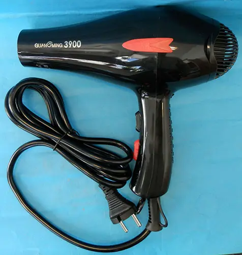 Foto do aviso oficial: Guangming Professional Hair Dryer Secador de cabelo — risco: Queimaduras & Choque elétrico
