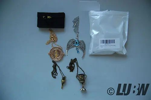 Photo from the official notice: PPX PPX 9 Stücke Zeitumkehrer Heiligtümer des Todes Goldenen Schnatz Halskette Zauberstein Anhänger necklace w — chemical risk