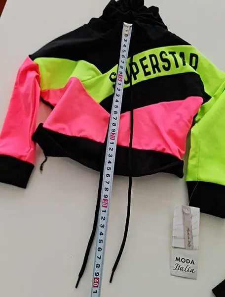 Foto uit de officiële melding: Moda Italia Kinderkleding set — risico: Verwurging