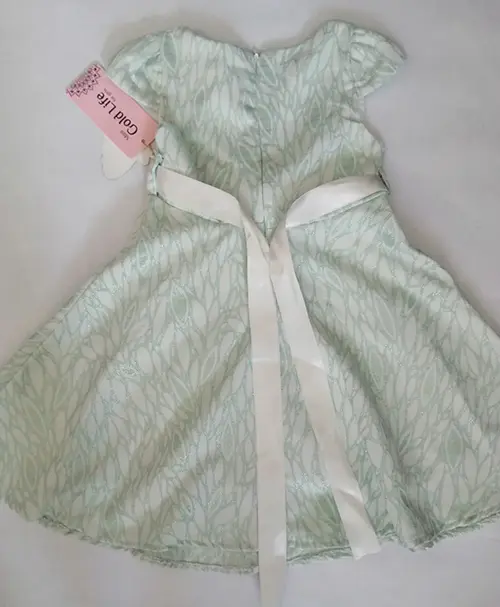 Photo de l’avis officiel: Gold Life Robe d’enfant — risque: Blessures