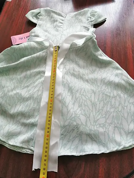 Photo de l’avis officiel: Gold Life Robe d’enfant — risque: Blessures