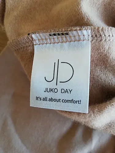 Foto uit de officiële melding: Juko Day Kinder trainingspak — risico: Verwurging