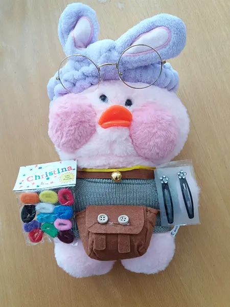 Photo from the official notice: Lalafanfan Pink plush stuffed toy duck with puffy pink cheeks „Lalafanfan“ soft toy — choking risk