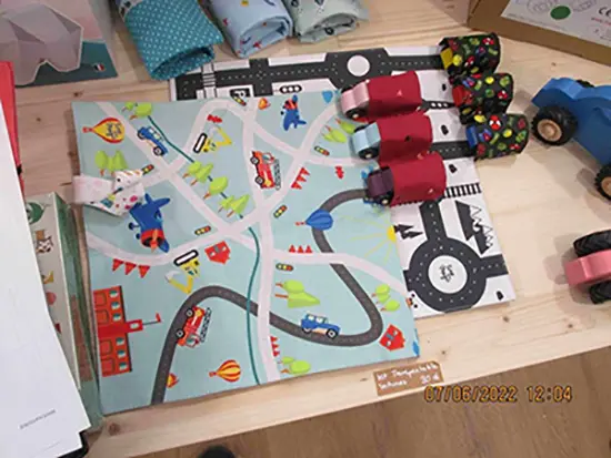 Foto aus der offiziellen Meldung: tinymagic Spielzeug-Auto-Rundfahrt — Risiko: Ersticken