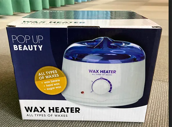 Photo from the official notice: POP UP BEAUTY WAX HEATER — burns & electric shock risk