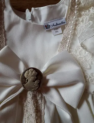 Photo de l’avis officiel: Andreeatex Robe de bébé — risque: Blessures