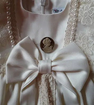 Photo de l’avis officiel: Andreeatex Robe de bébé — risque: Blessures