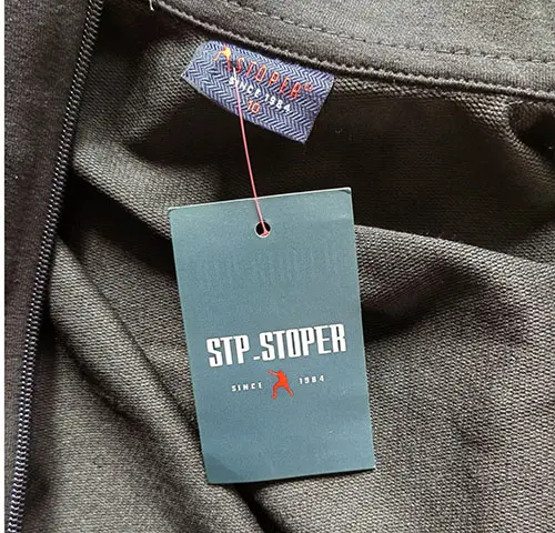 Foto uit de officiële melding: STP-STOPER Sportkleding voor kinderen — risico: Verwonding