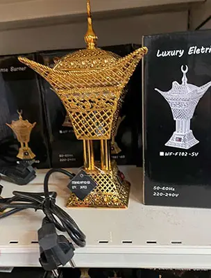 Photo from the official notice: AMIR'S DECO Luxury Electric Incense Burner — electric shock & fire risk
