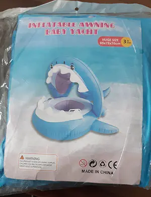 Foto aus der offiziellen Meldung: INFLATABLE AWNING BABY YACHT Aufblasbarer Babyschwimmschwimmer — Risiko: Ersticken