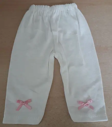 Photo from the official notice: MINI LUCK babies' clothing set — choking risk