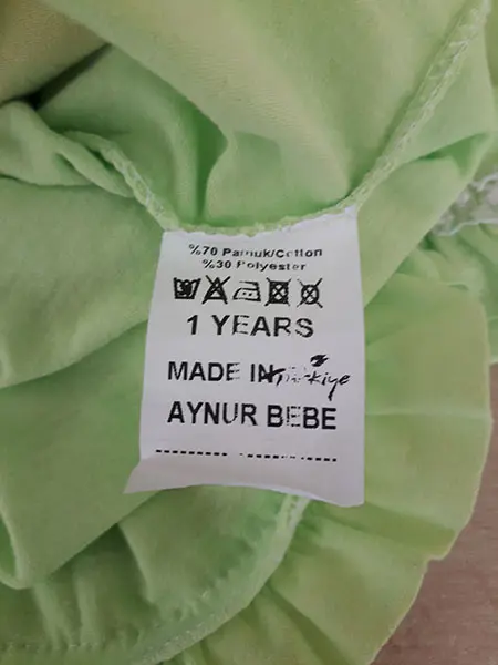 Foto do aviso oficial: AYNUR BEBE Marie Blusa infantil — risco: Engasgamento