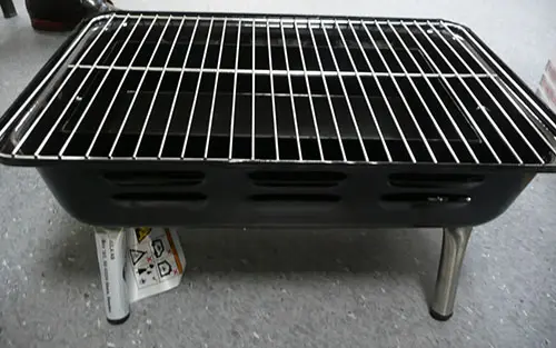 Foto uit de officiële melding: Burns&amp;Barkles Portable Charcoal Grill Draagbare houtskoolgrill — risico: Brandwonden