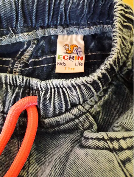 Photo from the official notice: Ecrin Kids Life children's shorts — choking & injuries risk